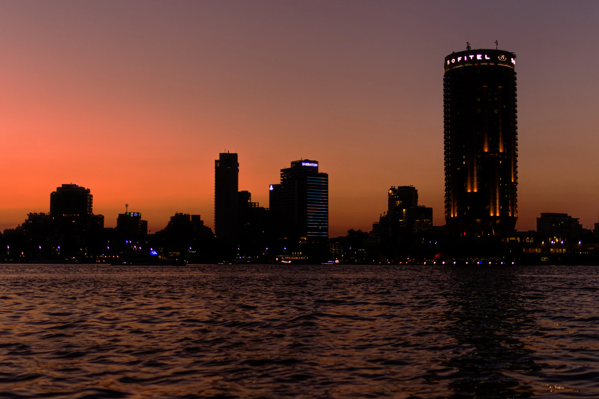 The Nile and Cairo skyline at dusk. Reference photography, not a Victory listing